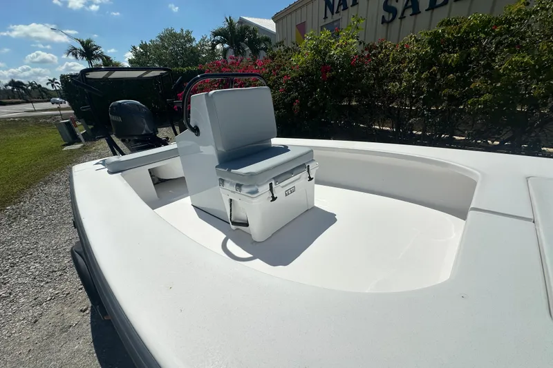 Slide: The Image of 2026 Delta Boatworks Delta D18 with seating and Yeti cooler on deck. - 7