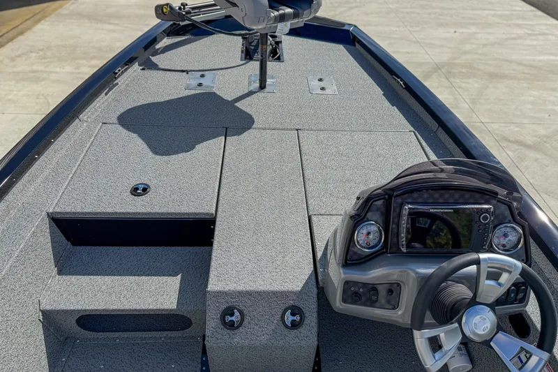 Slide: The Image of 2026 G3 Sportsman 1810 boat interior with steering console and deck layout. - 10