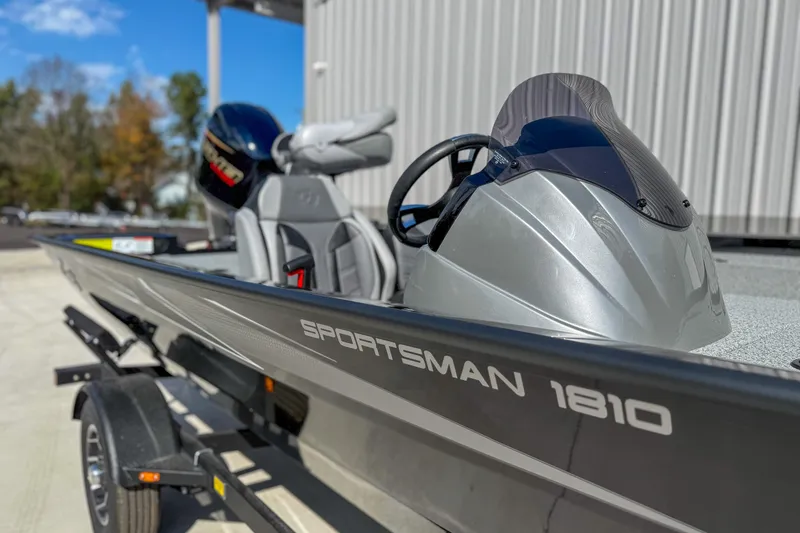 Slide: The Image of 2026 G3 Sportsman 1810 boat on trailer, sleek design, outdoor setting. - 5