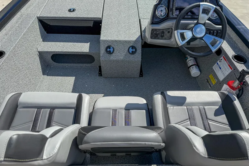 Slide: The Image of Interior view of 2026 G3 Sportsman 1810 boat with steering wheel and seating. - 9
