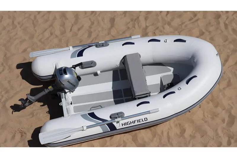Slide: The Image of Manufacturer Provided Image: 2025 Highfield UltraLite 260 inflatable boat on sandy beach. - 3