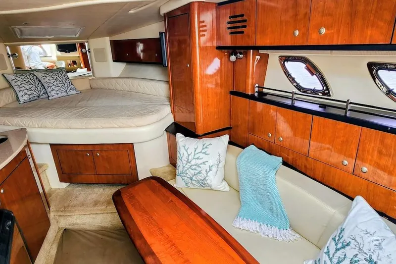 Slide: The Image of Luxurious interior of a 2007 Sea Ray Sundancer 310 yacht with elegant wood finishes. - 9