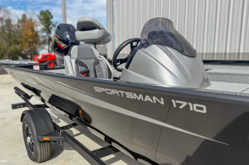 Slide: The Image of 2026 G3 Sportsman 1710 boat on trailer, featuring sleek design and modern seating. - 5