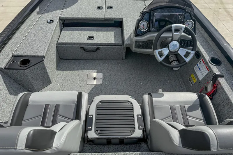 Slide: The Image of 2026 G3 Sportsman 1710 boat interior with steering wheel and seating. - 9