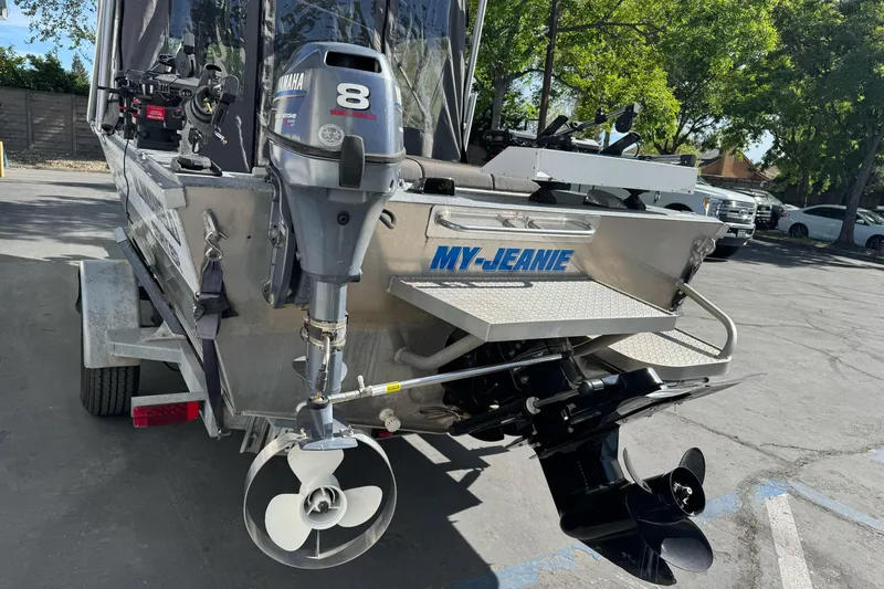 Slide: The Image of 2006 Alumaweld Stryker Sport 19 boat with Yamaha 8 outboard motor on trailer. - 4