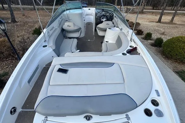 Slide: The Image of 2013 Rinker 246 Captiva Bowrider with spacious seating and modern dashboard. - 14