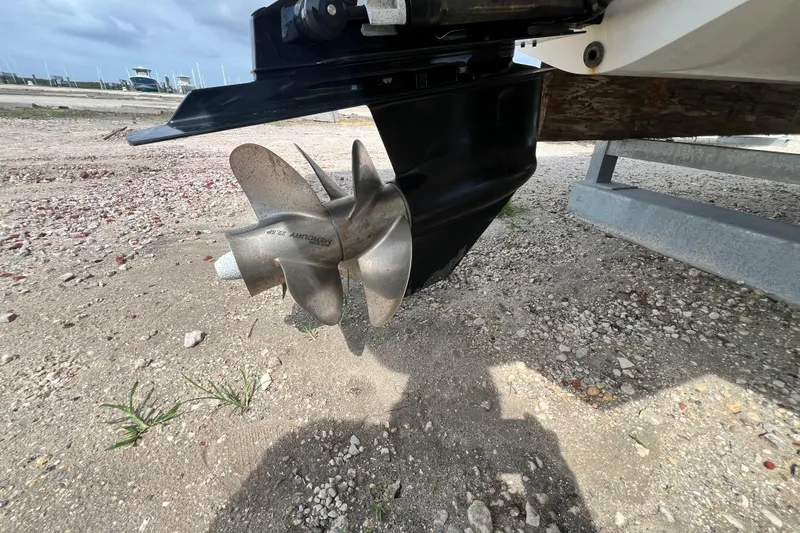 Slide: The Image of Propeller of a 2015 Monterey 268SS Super Sport boat on a sandy surface. - 15