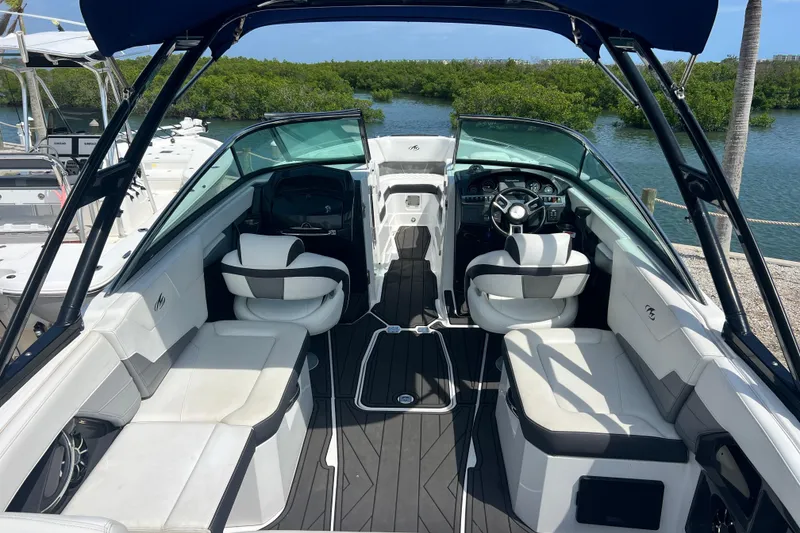 Slide: The Image of 2015 Monterey 268SS Super Sport boat interior with sleek seating and modern dashboard. - 18