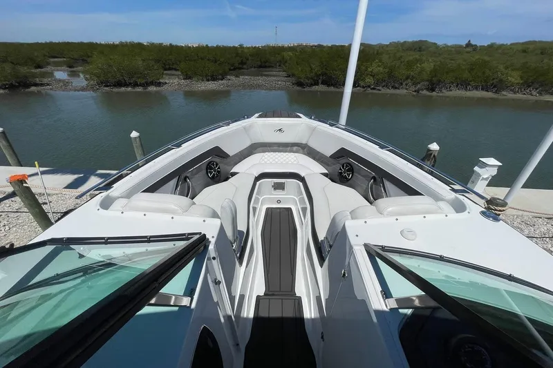 Slide: The Image of 2015 Monterey 268SS Super Sport boat interior with sleek seating and water view. - 19