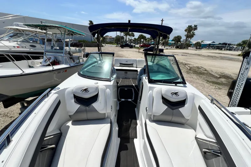 Slide: The Image of 2015 Monterey 268SS Super Sport boat with sleek interior and dual windshields. - 22