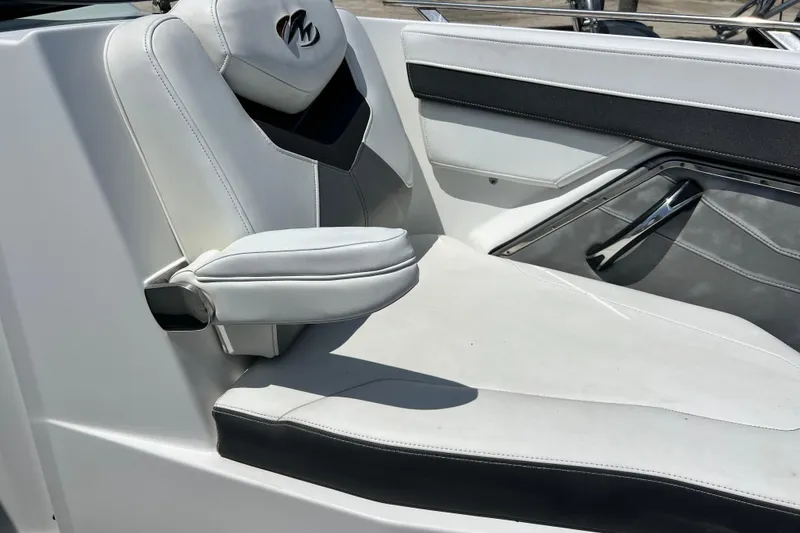 Slide: The Image of 2015 Monterey 268SS Super Sport boat seat with white and black upholstery. - 24
