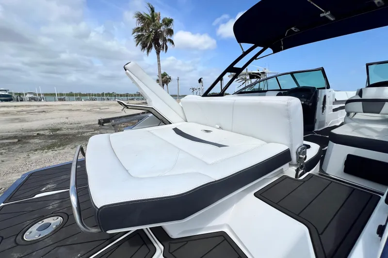 Slide: The Image of 2015 Monterey 268SS Super Sport boat with white seating and sleek design. - 27