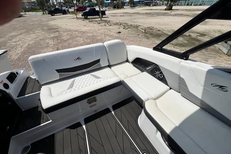 Slide: The Image of 2015 Monterey 268SS Super Sport boat interior with white seating and sleek design. - 28