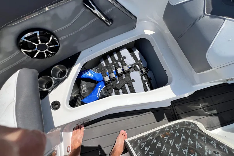 Slide: The Image of Interior of a 2015 Monterey 268SS Super Sport boat with storage compartment and speaker. - 38