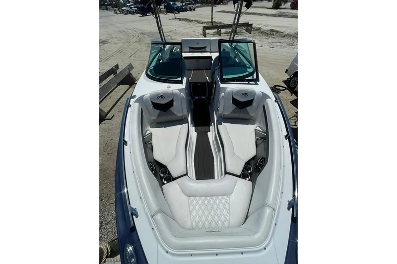 Slide: The Image of 2015 Monterey 268SS Super Sport boat interior with white seating and open windshield. - 4