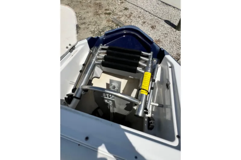 Slide: The Image of 2015 Monterey 268SS Super Sport boat ladder and storage compartment. - 41