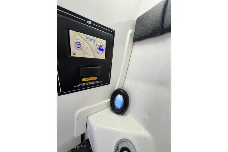 Slide: The Image of Control panel inside 2015 Monterey 268SS Super Sport boat, featuring Tecma system. - 43