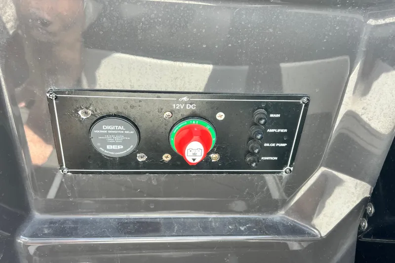 Slide: The Image of Control panel of a 2015 Monterey 268SS Super Sport boat with switches and voltage relay. - 45