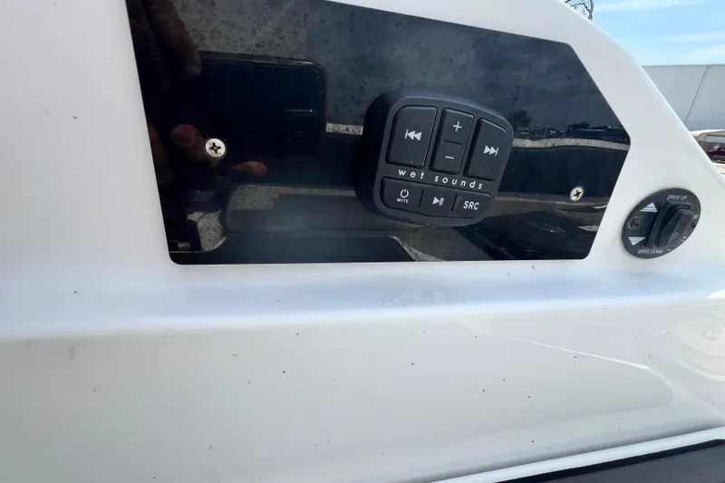 Slide: The Image of Control panel on a 2015 Monterey 268SS Super Sport boat with audio and drive controls. - 46