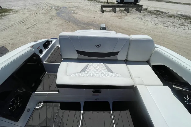 Slide: The Image of 2015 Monterey 268SS Super Sport boat interior with white seating and sleek design. - 5