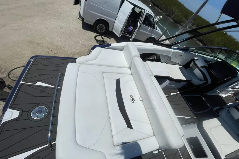 Slide: The Image of 2015 Monterey 268SS Super Sport boat with white seating and sleek design. - 6