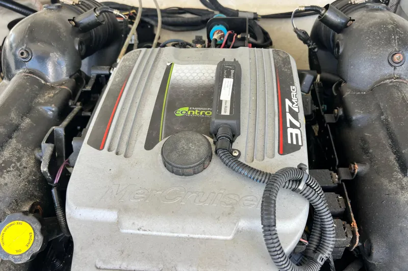 Slide: The Image of Engine of a 2015 Monterey 268SS Super Sport boat, featuring MerCruiser 377 MAG. - 60
