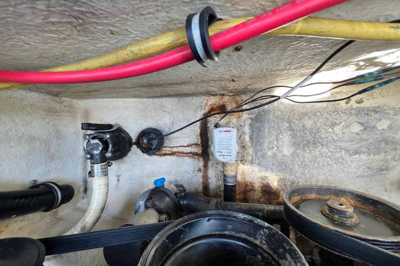 Slide: The Image of Engine compartment of a 2015 Monterey 268SS Super Sport boat, showing wiring and components. - 68