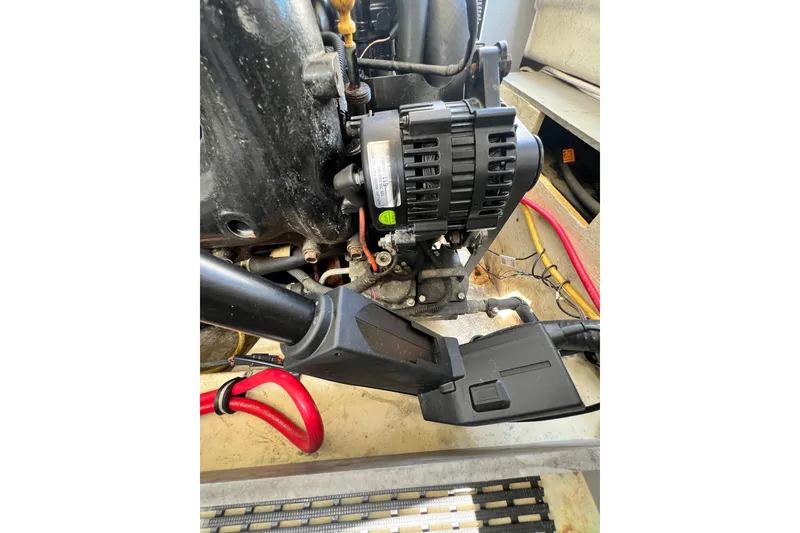Slide: The Image of Engine compartment of a 2015 Monterey 268SS Super Sport boat, showing mechanical components. - 69