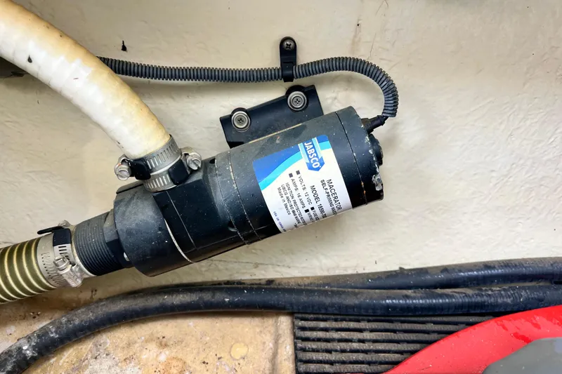Slide: The Image of Jabsco macerator pump installed in a 2015 Monterey 268SS Super Sport boat. - 70