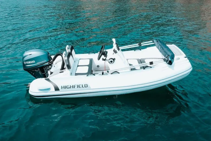 The Image of Manufacturer Provided Image: 2025 Highfield Sport 330 boat on clear blue water. - 0