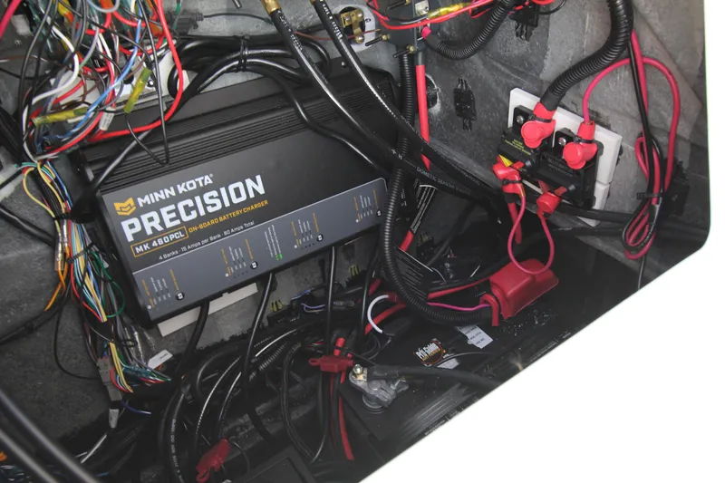 Slide: The Image of 2023 Vexus AVX2180CC boat wiring with Minn Kota Precision onboard battery charger. - 9