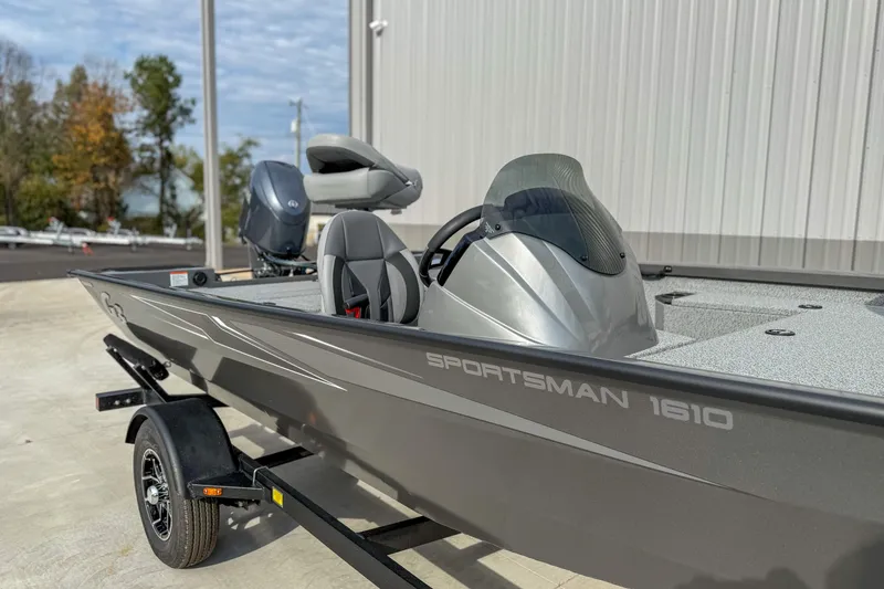 Slide: The Image of 2026 G3 Sportsman 1610 boat on trailer, parked outdoors. - 5