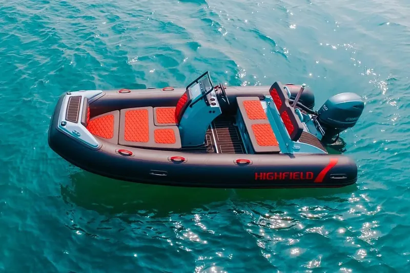 The Image of Manufacturer Provided Image: 2025 Highfield Sport 420 inflatable boat on clear blue water. - 0