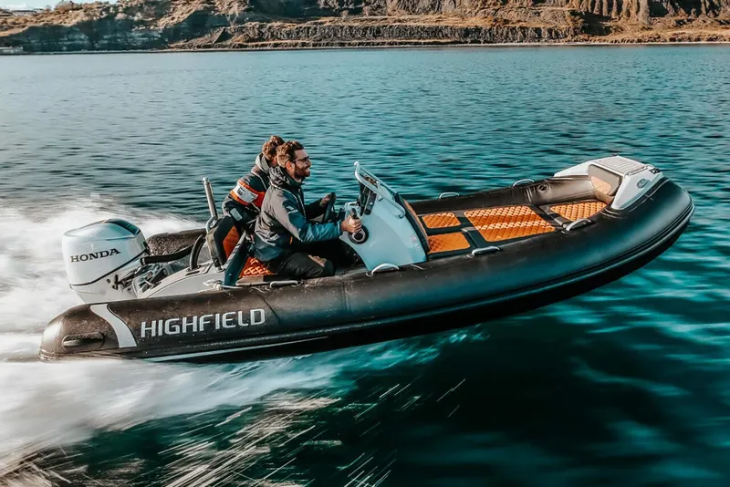 The Image of Manufacturer Provided Image: Highfield Sport 460 boat speeding on water, 2025 model, with Honda engine. - 0
