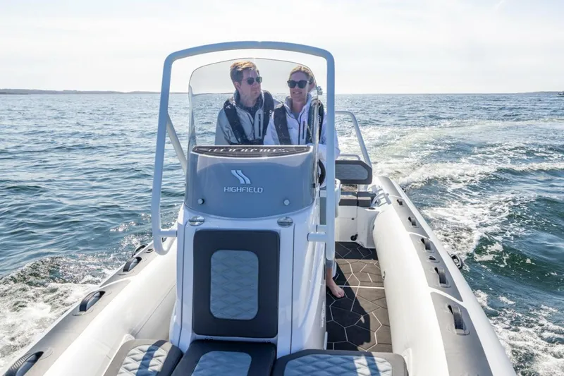 Slide: The Image of Manufacturer Provided Image: 2025 Highfield Sport 560 boat cruising on open water. - 2