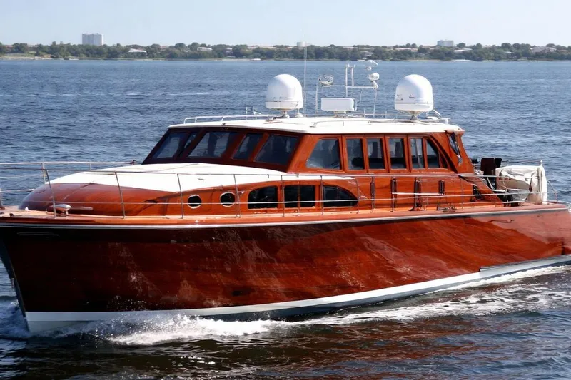 The Image of Luxurious 2009 Custom Saint Model 65 Commuter yacht cruising on open water. - 1