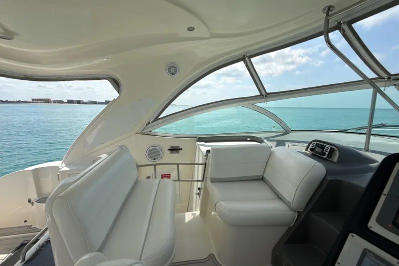 Slide: The Image of Interior view of 2006 Cruisers Yachts 420 Express with ocean backdrop. - 11