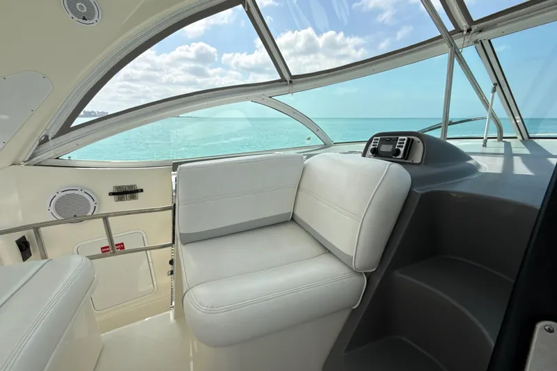 Slide: The Image of Interior view of 2006 Cruisers Yachts 420 Express with ocean backdrop. - 13