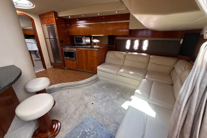 Slide: The Image of Luxurious interior of 2006 Cruisers Yachts 420 Express with leather seating and modern kitchen. - 20