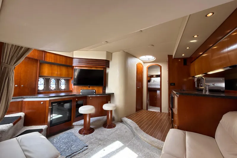 Slide: The Image of Luxurious interior of 2006 Cruisers Yachts 420 Express with modern amenities and elegant design. - 21