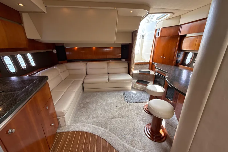 Slide: The Image of Luxurious 2006 Cruisers Yachts 420 Express interior with leather seating and modern amenities. - 27