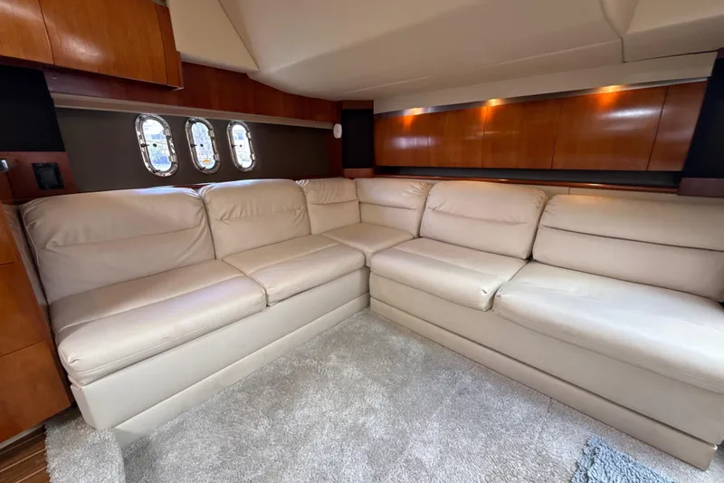 Slide: The Image of Luxurious interior of 2006 Cruisers Yachts 420 Express with beige leather seating. - 28