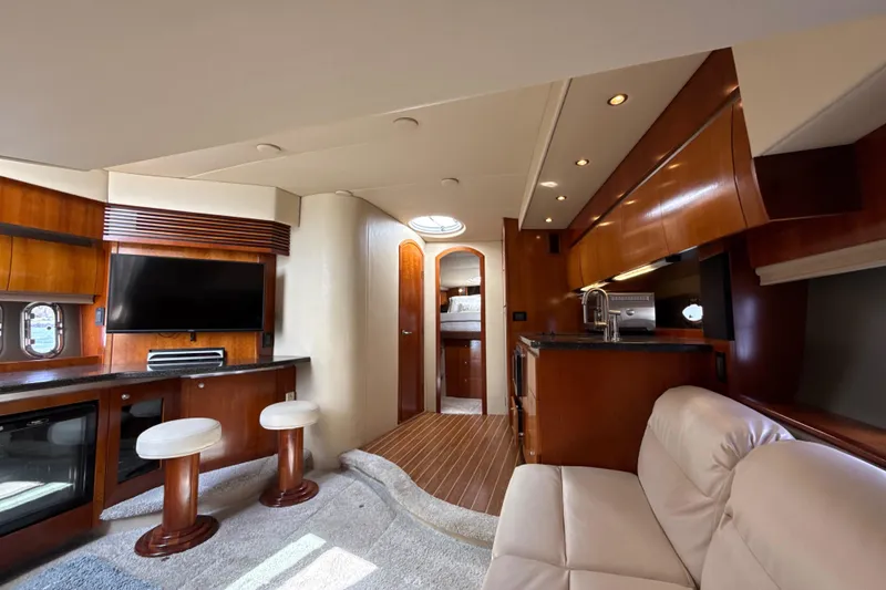 Slide: The Image of Luxurious interior of 2006 Cruisers Yachts 420 Express with modern amenities and elegant design. - 29