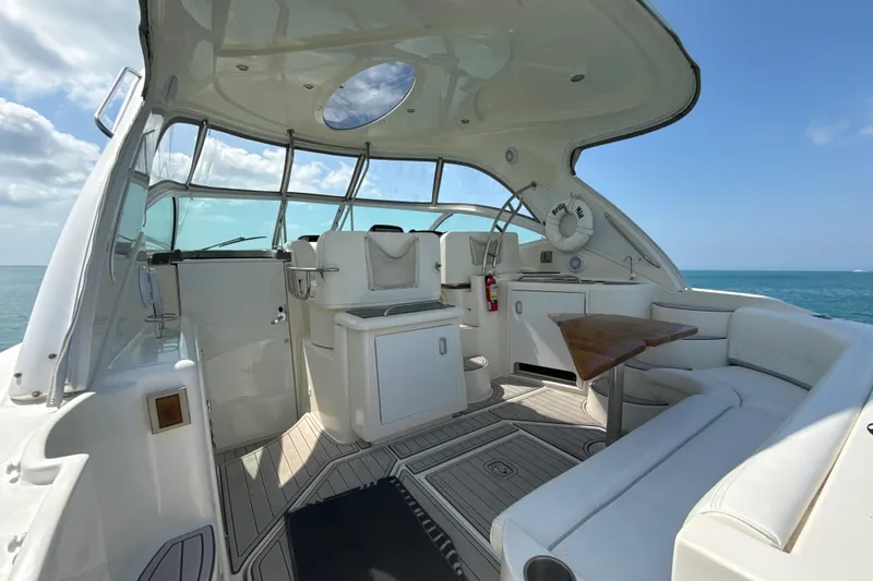 Slide: The Image of Luxurious 2006 Cruisers Yachts 420 Express interior with ocean view and elegant seating. - 3