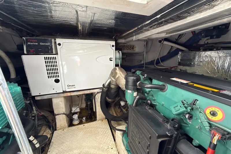 Slide: The Image of Engine room of 2006 Cruisers Yachts 420 Express with Onan Marine Generator. - 36