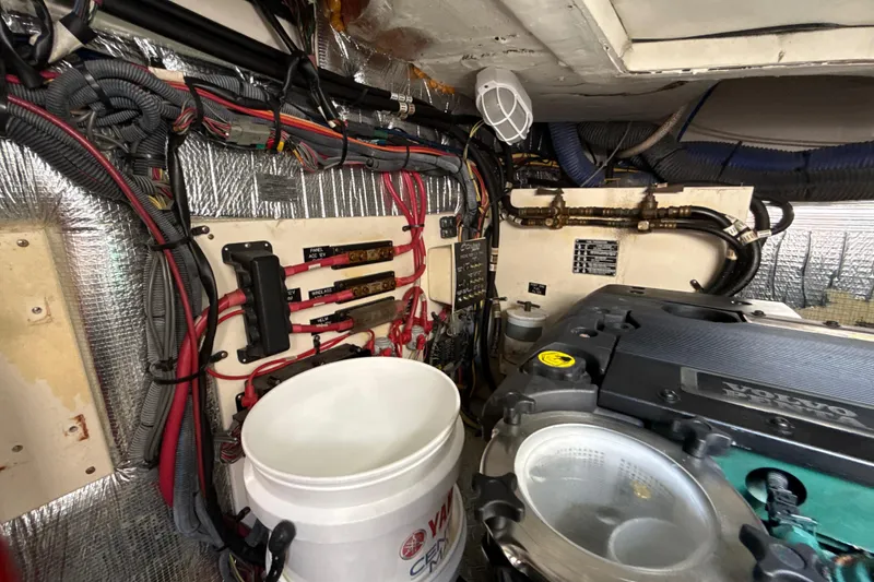 Slide: The Image of Engine room of a 2006 Cruisers Yachts 420 Express with wiring and Volvo engine. - 37