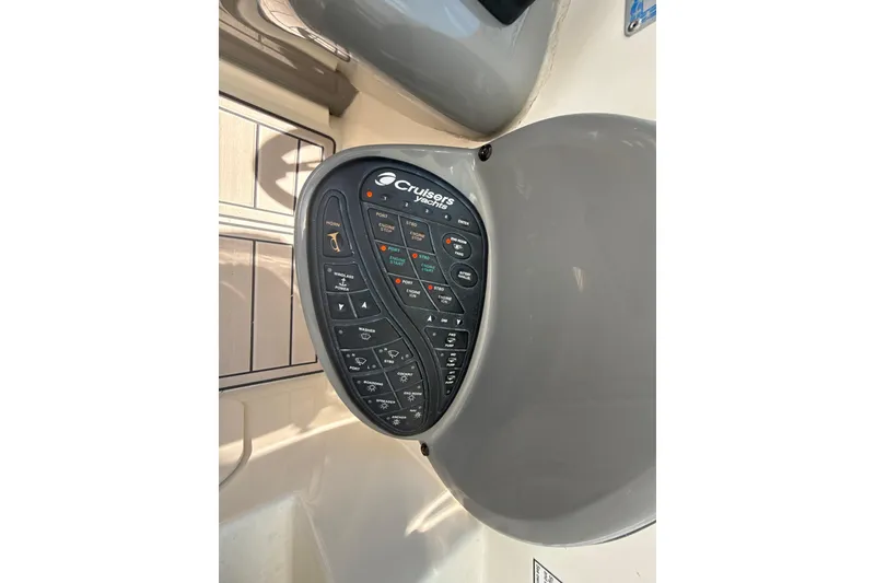 Slide: The Image of Control panel of a 2006 Cruisers Yachts 420 Express boat. - 38