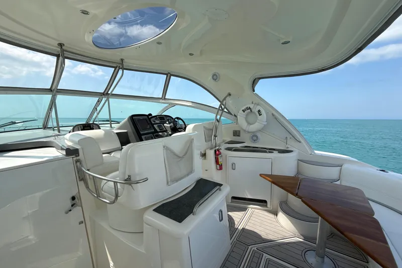 Slide: The Image of Luxurious 2006 Cruisers Yachts 420 Express interior with ocean view and modern helm. - 4