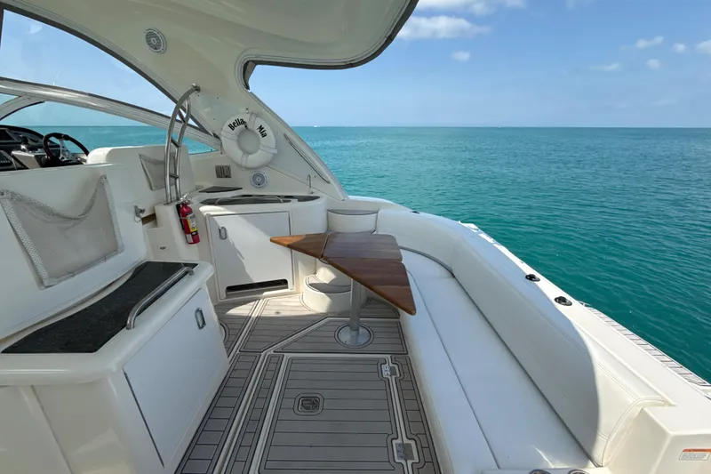 Slide: The Image of Luxurious 2006 Cruisers Yachts 420 Express interior with ocean view and elegant seating. - 5