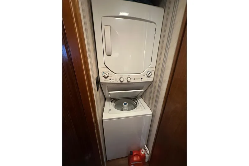 Slide: The Image of Stacked washer and dryer unit in a compact laundry space, Lazy Days 15x64 model, 1996. - 17